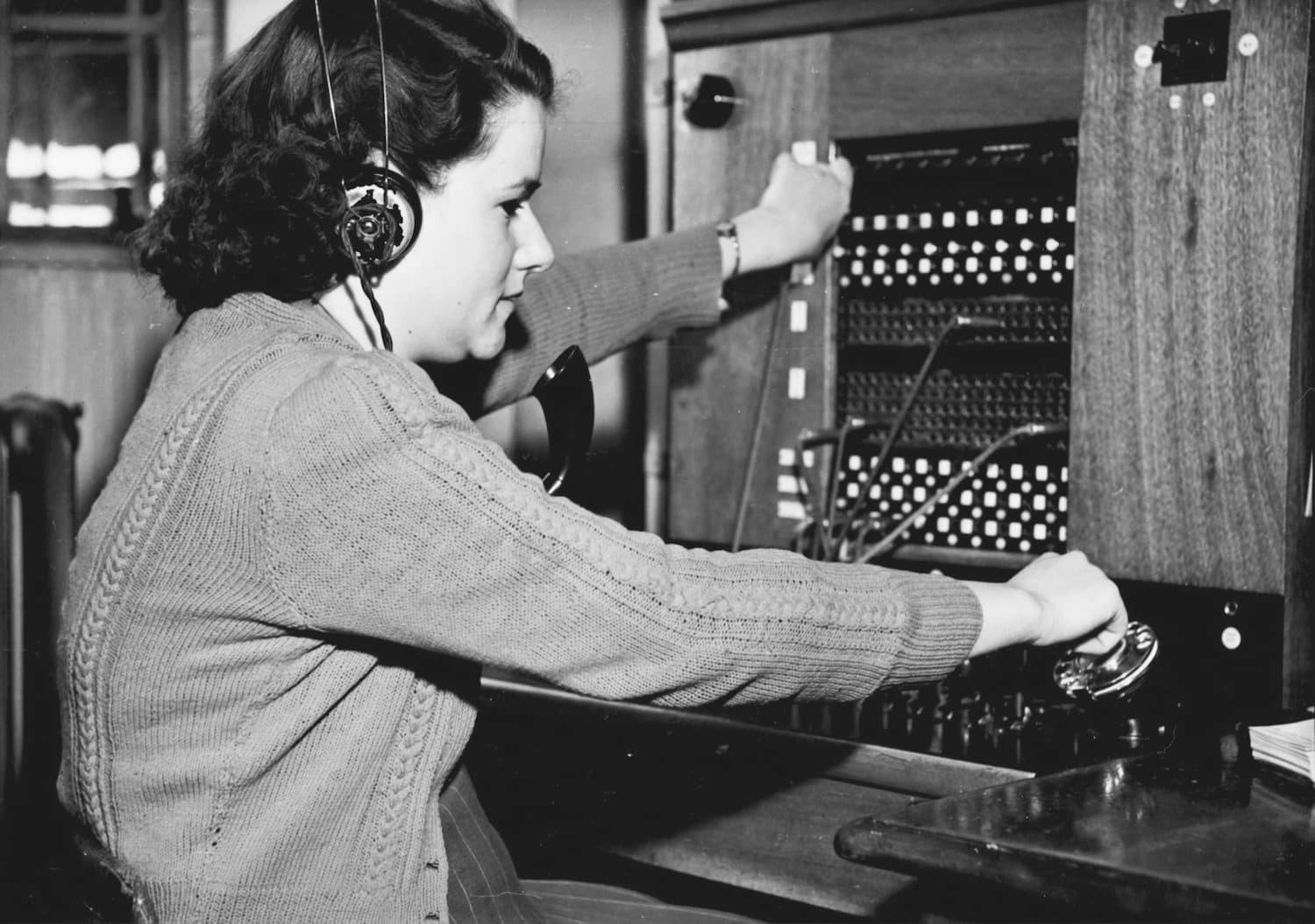 A photo of a switchboard operator
